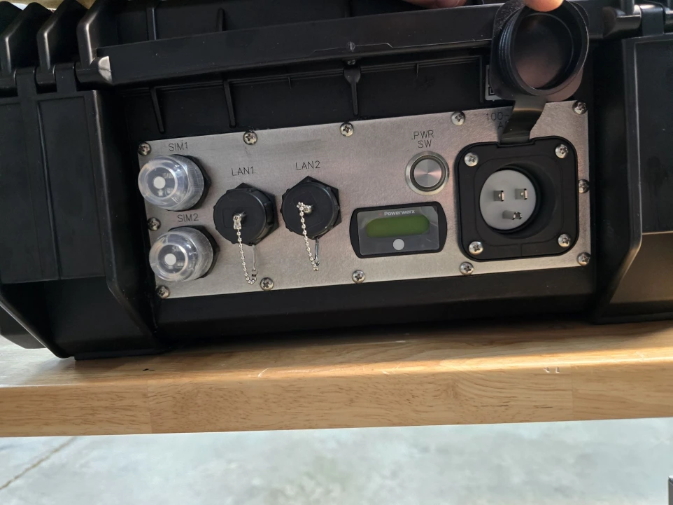 rear panel with 5G modem, 2 IP67 SIM slots, 2 PoE LAN ports, AC power input