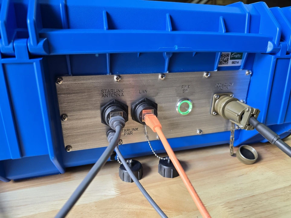 rear panel with MIL-STD connectors, external Starlink connectivity, AC power input