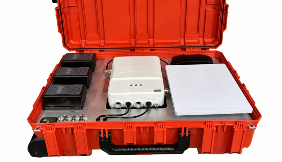 Sentinel LMR kit with lid open, showing Starlink Mini, removable batteries, SLR-1000 repeater